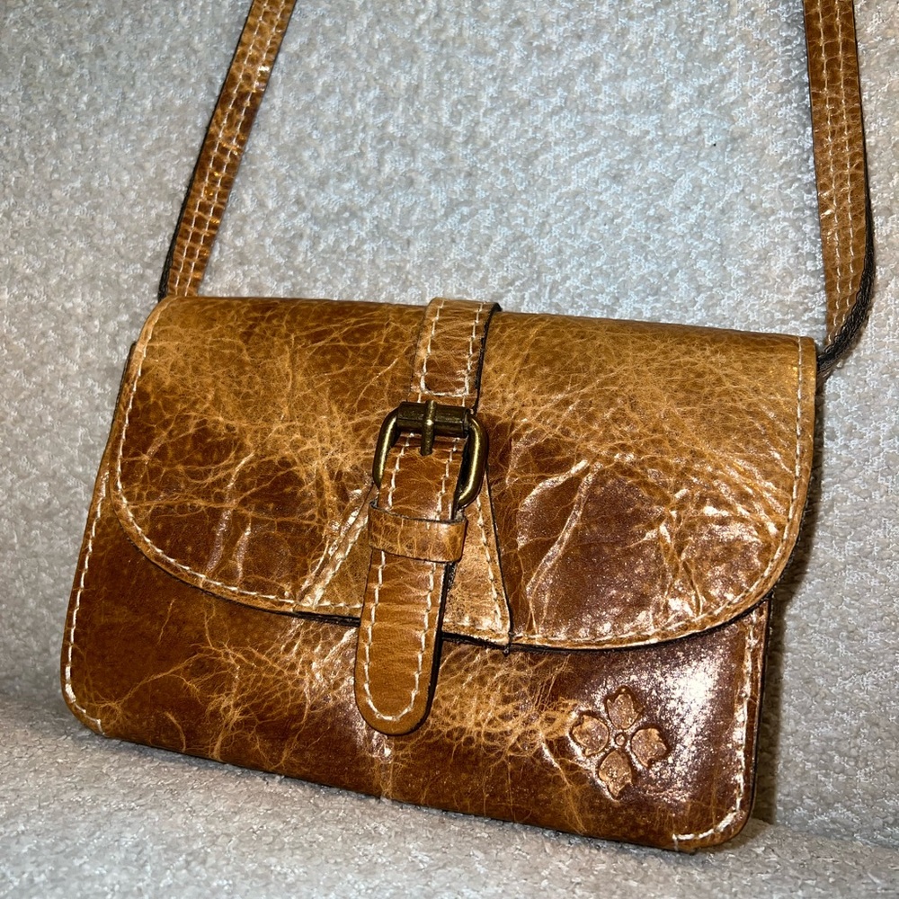Patricia Nash crossbody. Metalic Gold, brown, buckle purse.